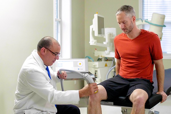 What Does Shockwave Therapy Feel Like, and Is It Painful?